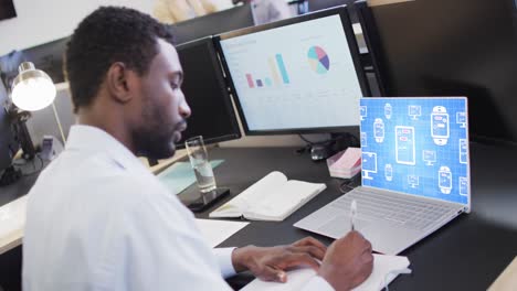 composition of african american businessman using laptop with ai chat on screen