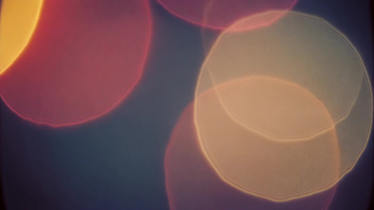 Abstract Background of Soft Glowing Colorful Bokeh Lights