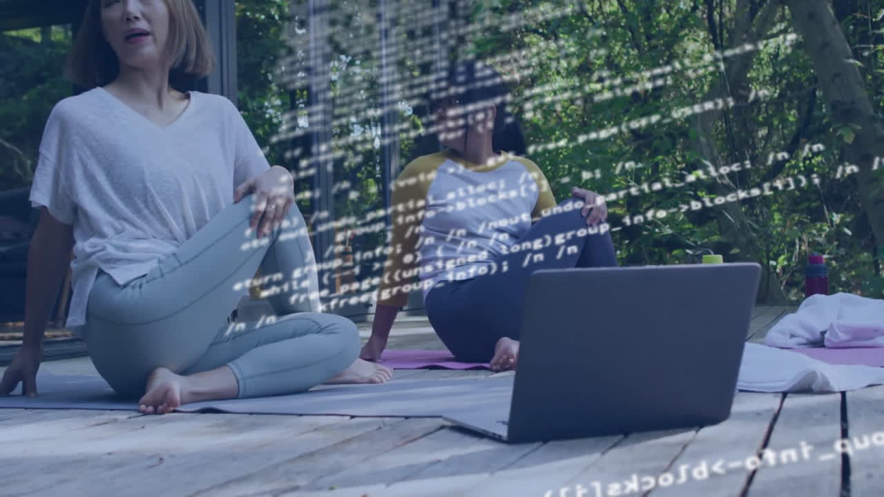 Animation of data processing over asian mother and daughter doing yoga