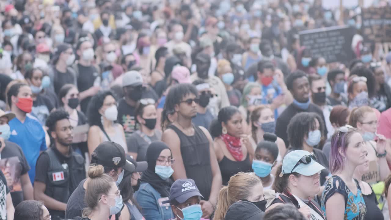 Tilt up shot of a large Black Lives Matter rally