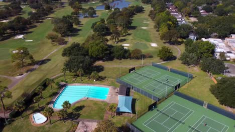 aerial view of golf course, with tennis courts and a swimming pool, at 60 frames