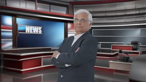 portrait of indian senior journalist standing crossed hands