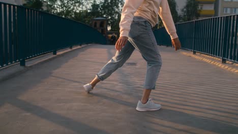 Black-woman-dancing-on-the-bridge.