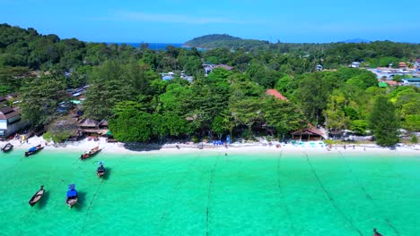 dream-beach-longtail-boats-in-turquoise-water