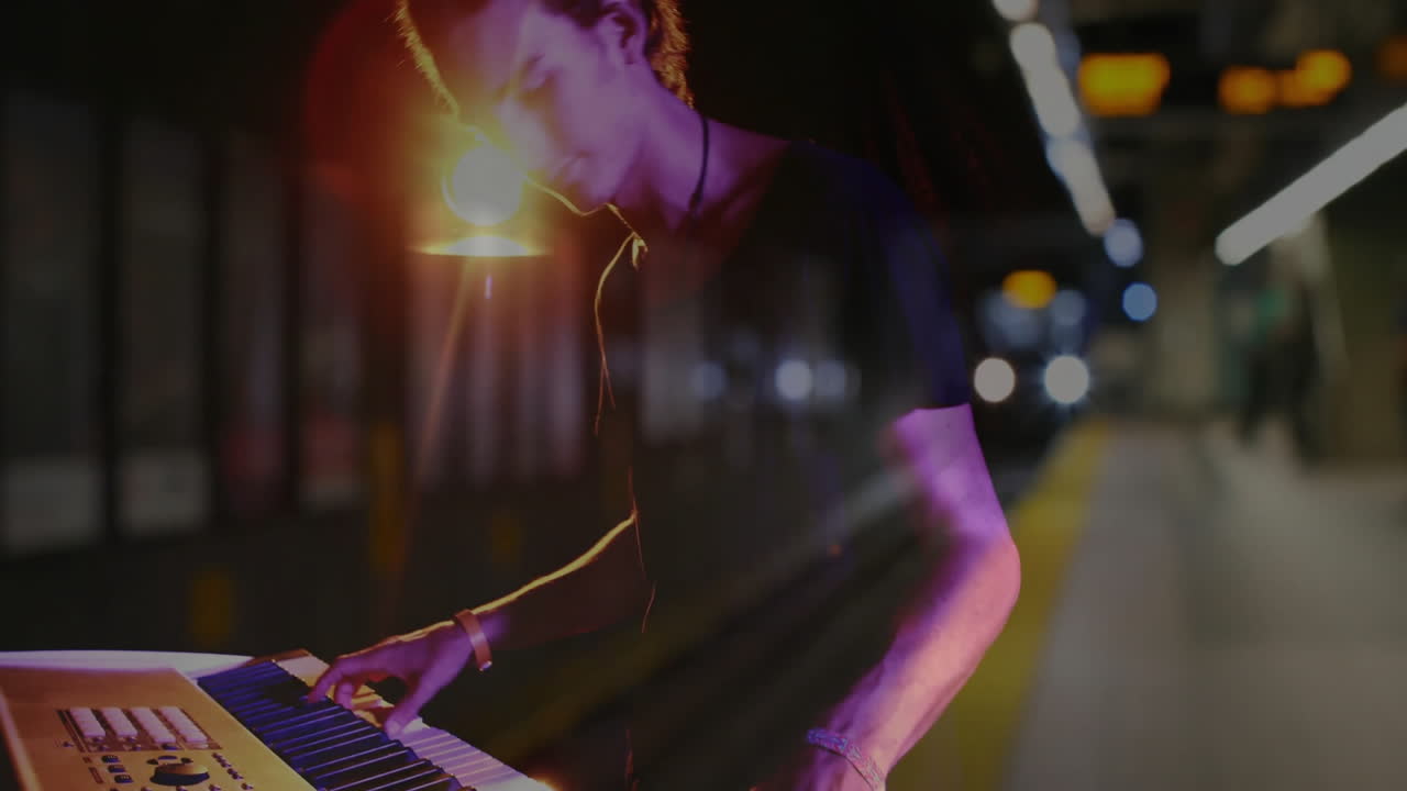 producer playing electronic keyboard on subway platform, with animated neon music notes flowing