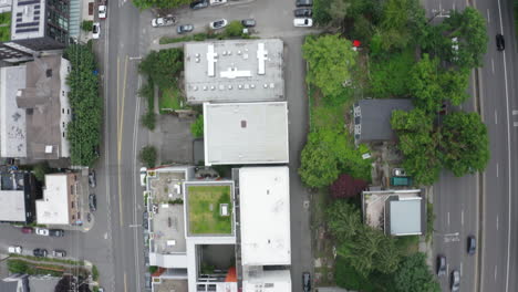 Overhead-drone-view-of-buildings-and-highway