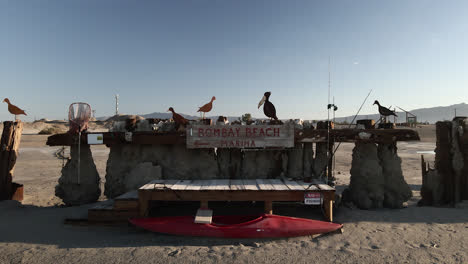 flying towards the bombay beach marina with steel birds sculpture at bombay beach in salton sea, california