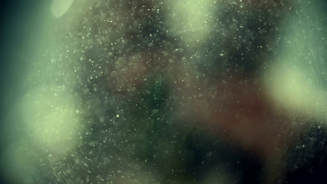 partículas flotantes en movimiento lento