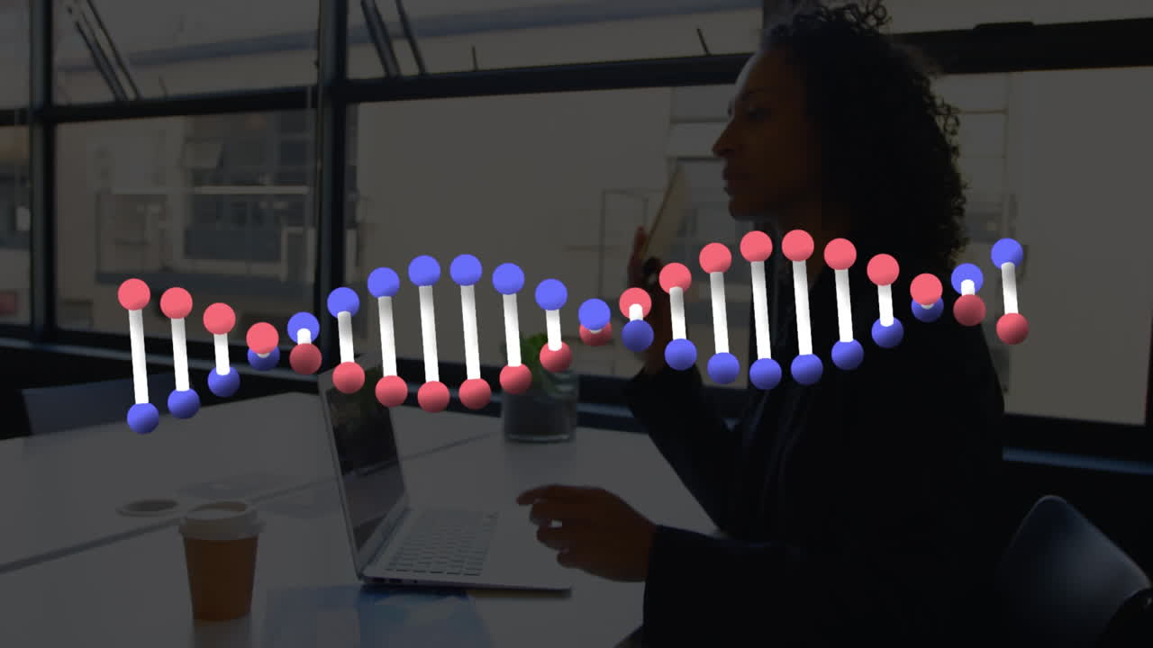 Animation of dna strand over businesswoman in office