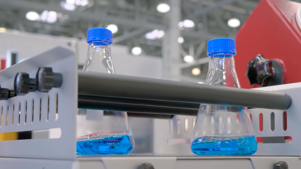 Orbital shaker for mixing, shaking, blending biological liquid in plastic flasks