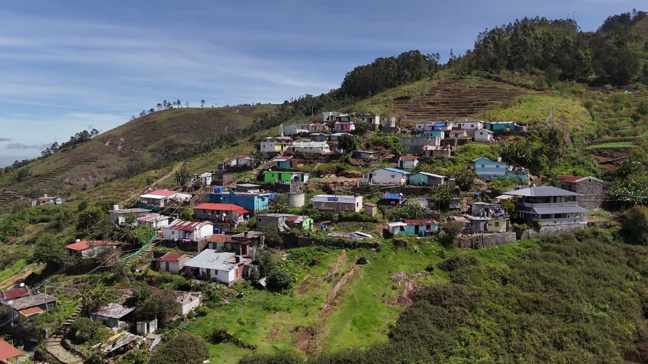 Stunning aerial of cloud banks drifting over mountain ridges in Kodaikanal