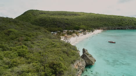 drone shot at the caribbean beach of the kenepa in the curacao island