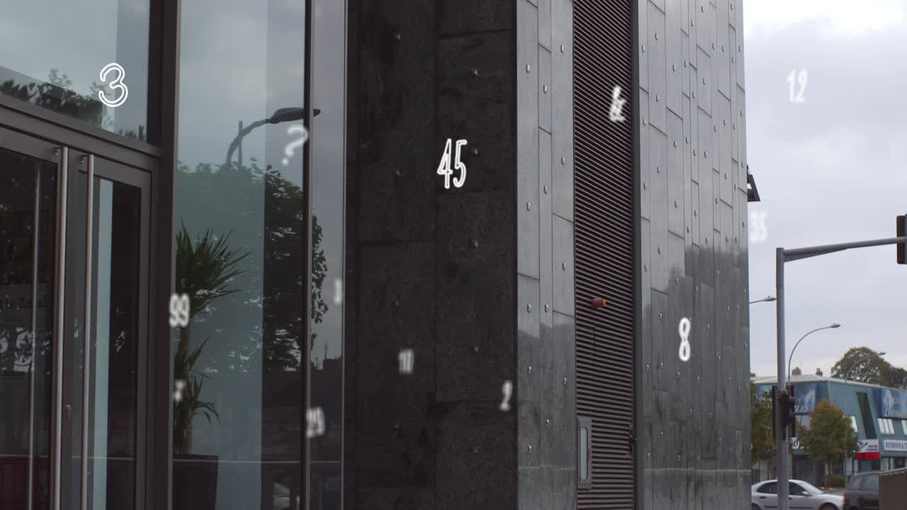 Numeric glyphs appearing, camera tilting up over facade corner, glyphs drifting to show facade data