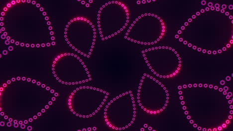 circular dots pattern on dark background with symmetry and varying sizes