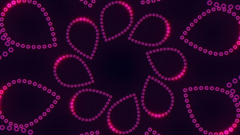 patrón de puntos circulares en fondo oscuro con simetría y diferentes tamaños