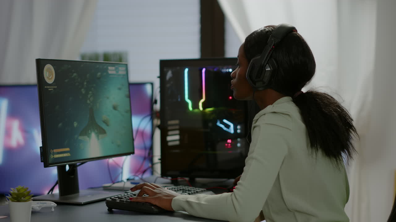 African happy gamer winning space shooter game