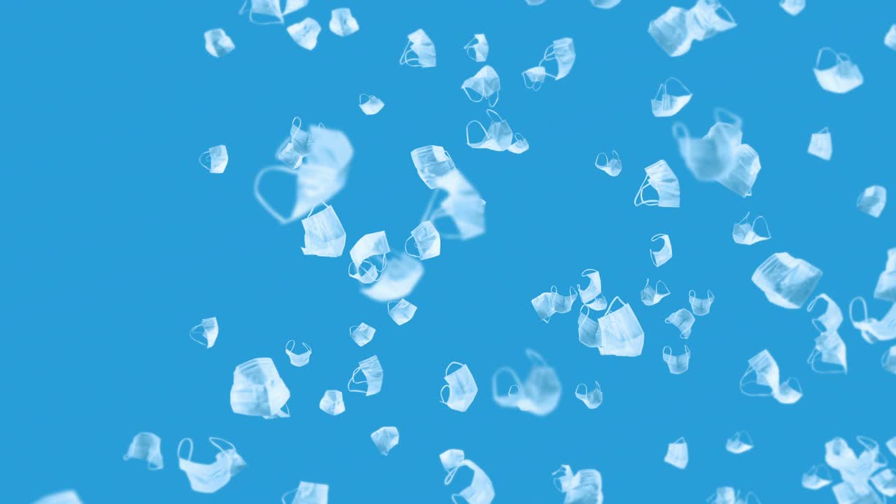 파란색 바탕에 많은 색 마스크를 날리는 의료 개념, 수술 보호 마스크, 마스크 회전의 3d 애니메이션, 루프 애니메이션.