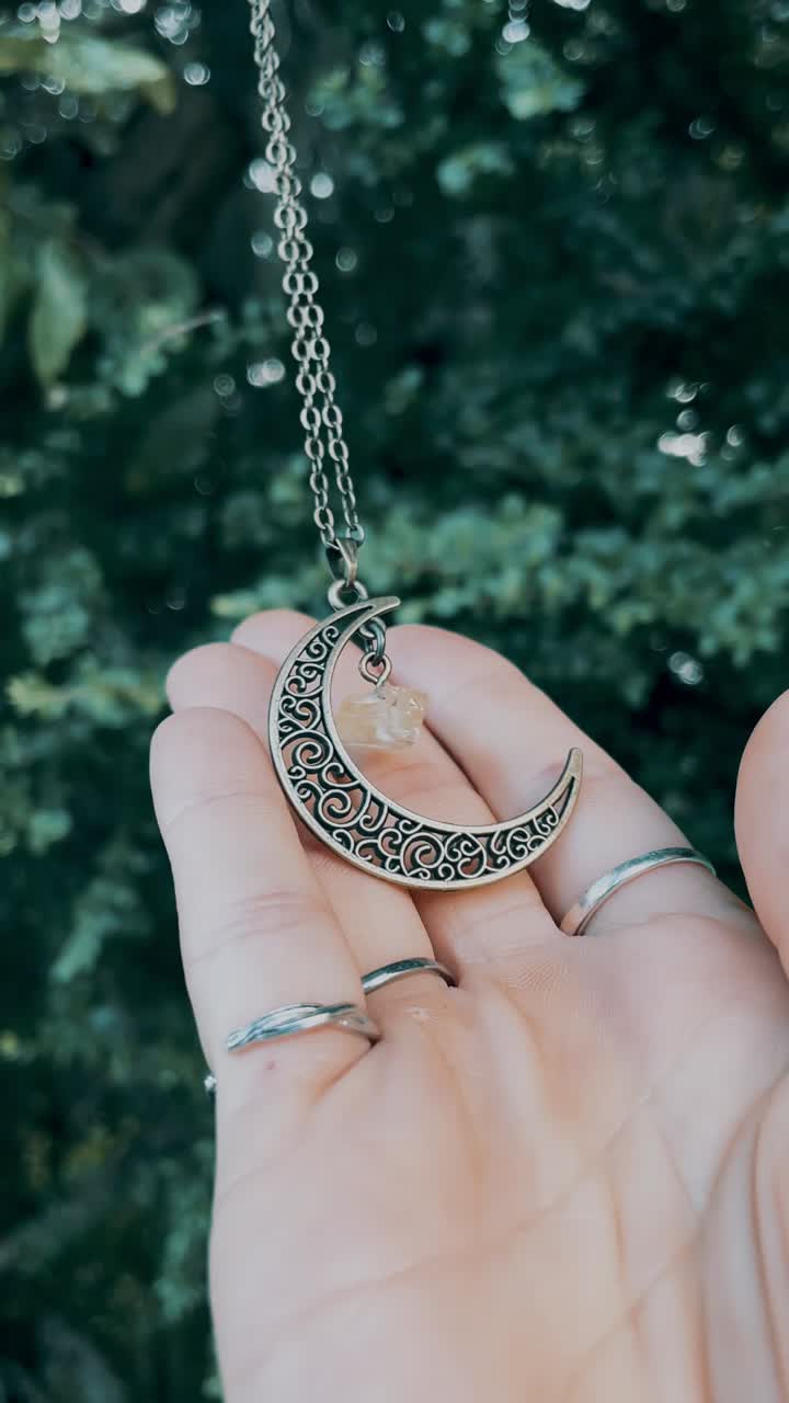 Moon Necklace in Hand