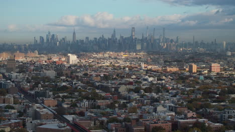 aerial view of the new york city skyline at sunrise