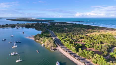 aerial view of boats and lush coastline