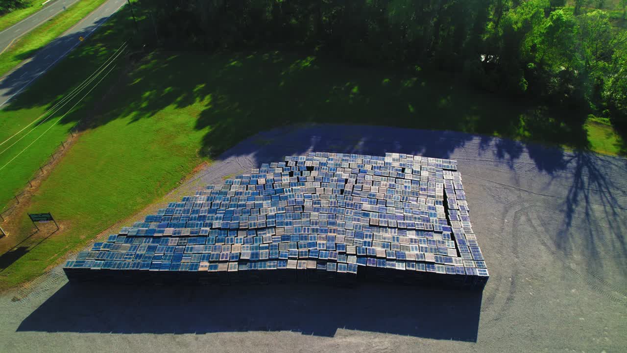 Overview Aerial View of Colorful Stacked Pallets in Industrial Storage Yard