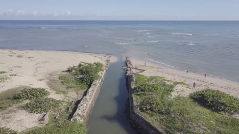 blue water canal through ocean aerial 4k dominican republic puerto plata