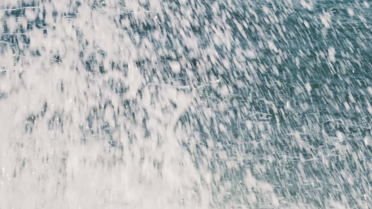 Strong splash of wild wave in coastline