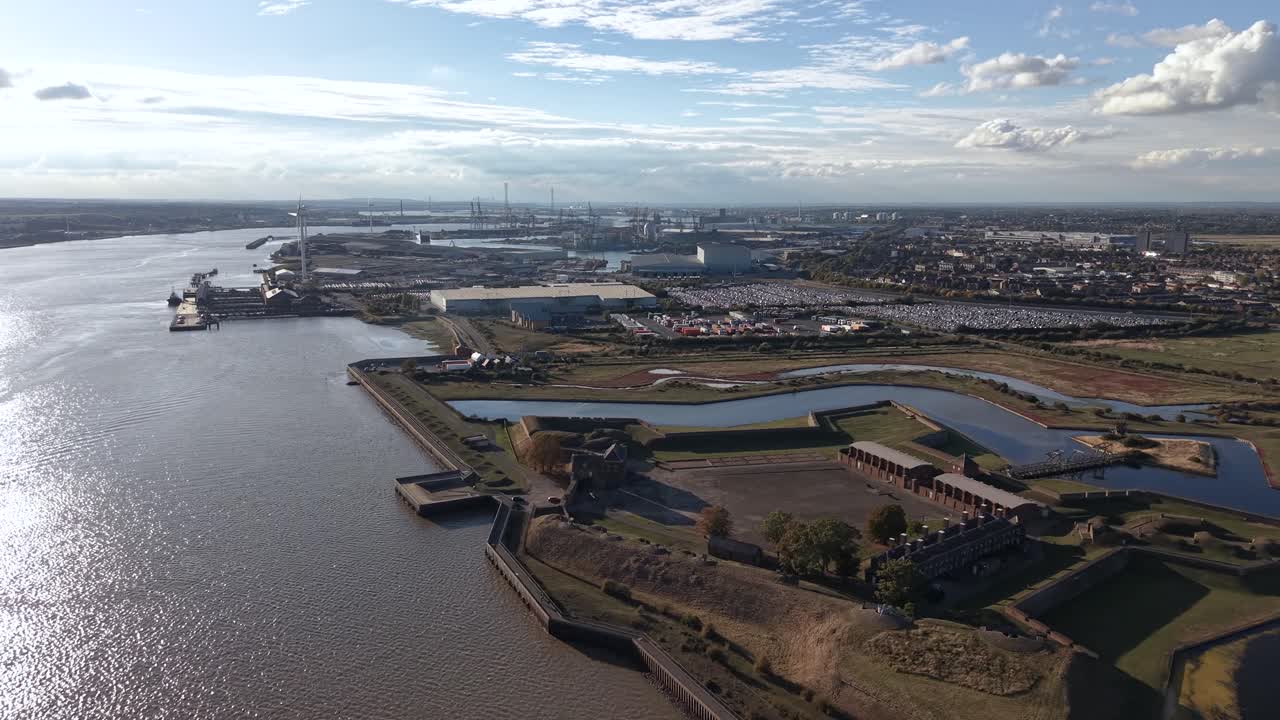 Tilbury fort star shaped artillery battlement aerial view over river Thames coastal countryside