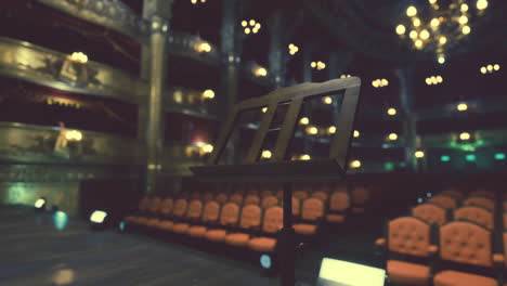 empty music stand on a stage in an opera house