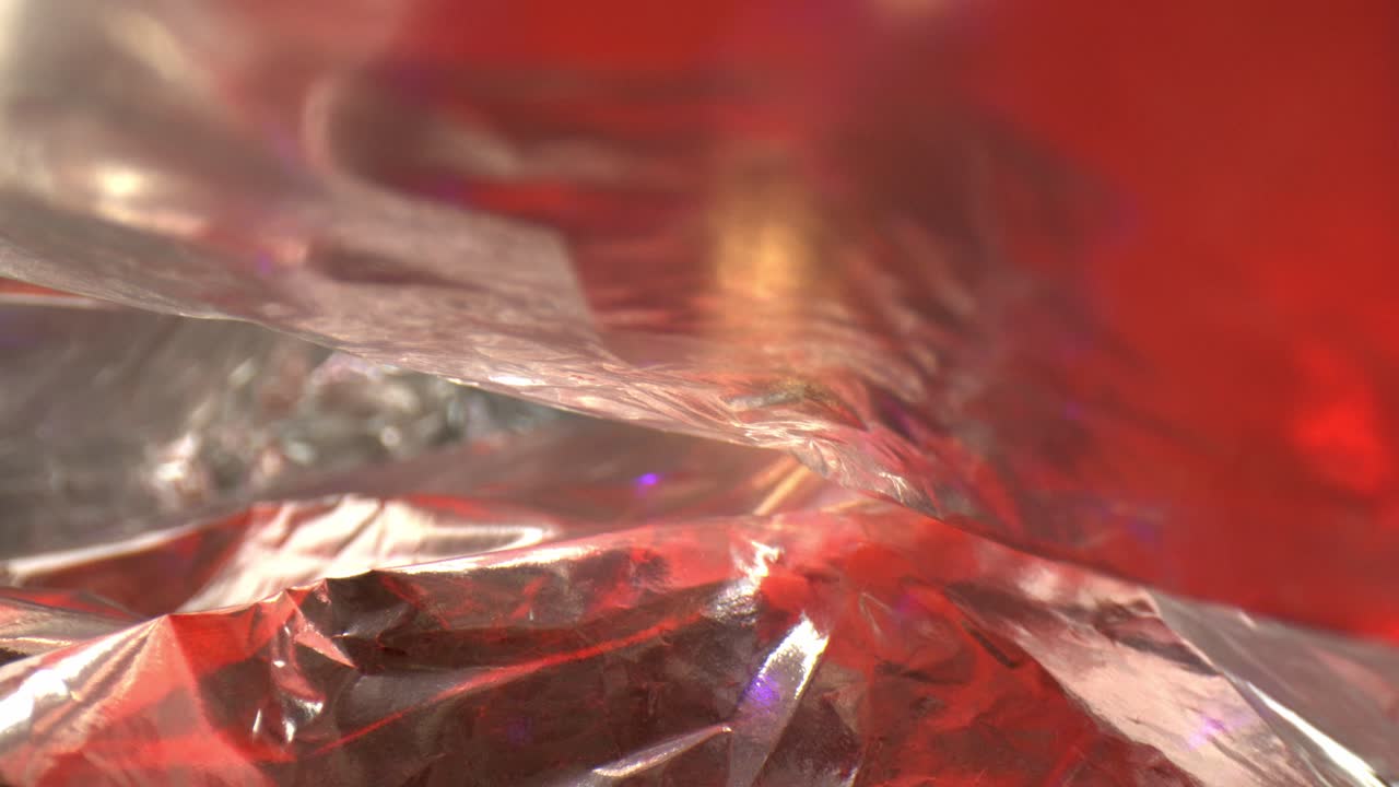 estante que enfoca dos capas de lámina brillante