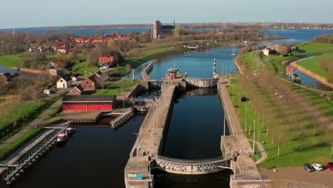 aerial: the locks of the canal through walcheren, near the historical town veere