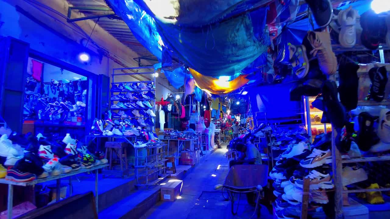 Vibrant Night Market Shoe Shopping in Africa
