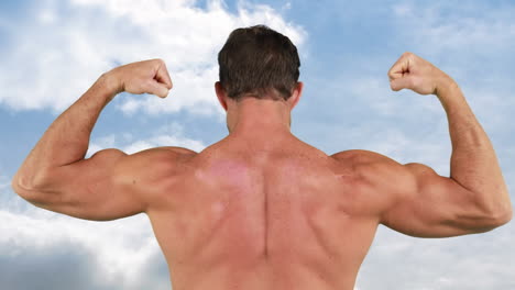 bodybuilder flexing his back muscles