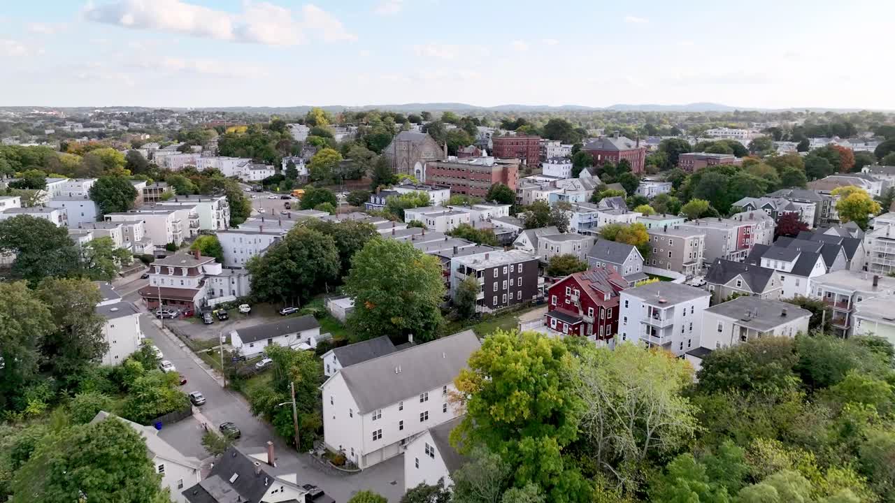 low aerial of homes in boston massachusetts suburbs and neighborhoods