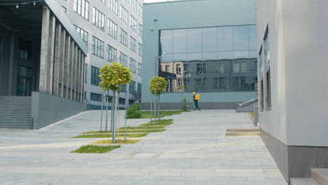 delivery person in modern urban campus