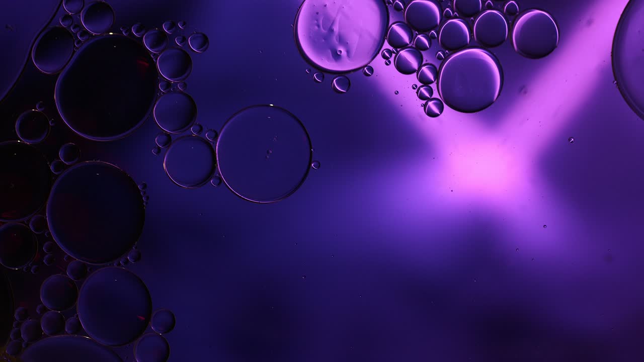 Abstract Colorful Food Oil Drops Bubbles and spheres Flowing