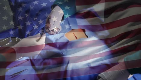 animación de la bandera de los estados unidos ondeando sobre los cirujanos en el quirófano