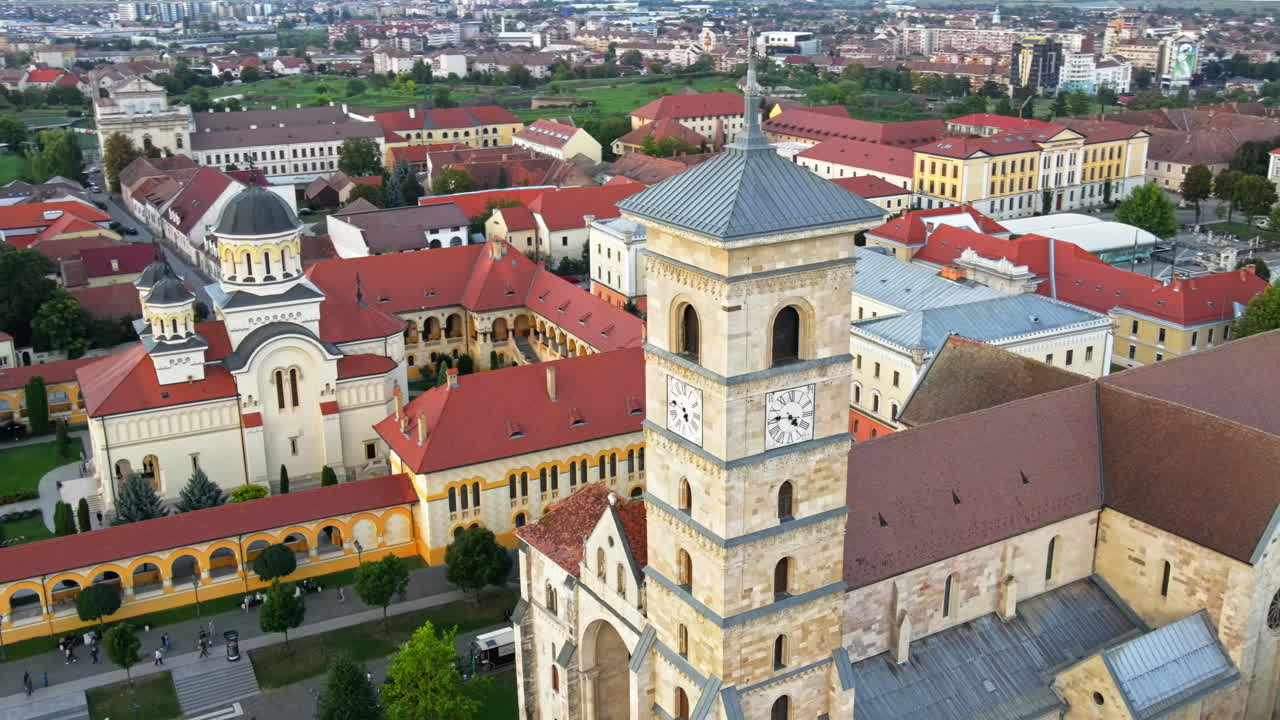 Aerial drone view of Alba Carolina Citadel in Alba-Iulia, Romania. Cityscape, multiple buildings, church, people