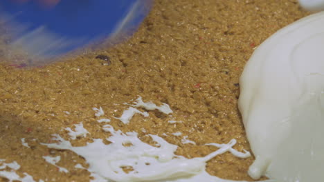 Icing-oozes-into-shot-on-top-of-a-flapjack-cake-slice