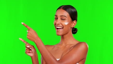 beauty, lotion and a woman pointing on a green