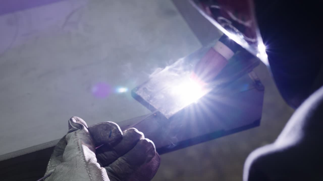 Welding process in an industrial setting