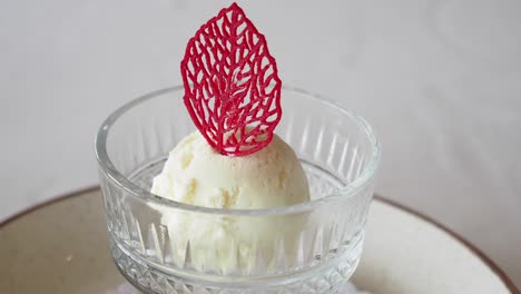 vanilla ice cream with red decoration