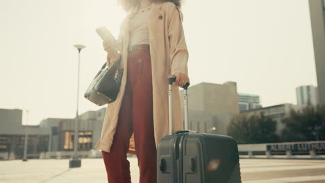 Cellphone,-suitcase-and-businesswoman-walking
