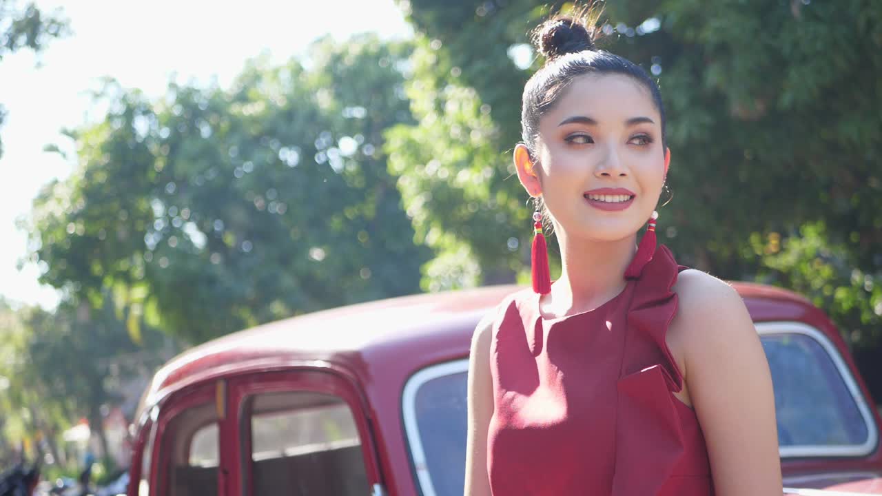 Beautiful Asian Woman In Red Suit With Vintage Car , Slow Motion