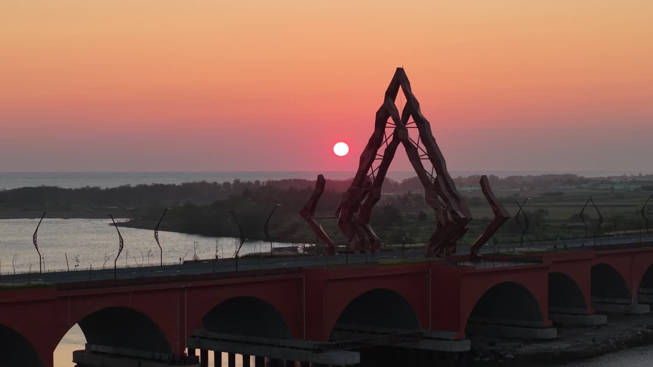 Aerial view of the Pandansimo Bridge at sunset, Bantul, Yogyakarta, as part of the southern ring road route of Java