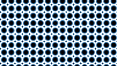 una gran cantidad de círculos negros azules vibrando y alejándose en un fondo oscuro abstracto
