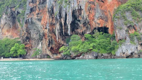 lush cliffs and turquoise sea in krabi