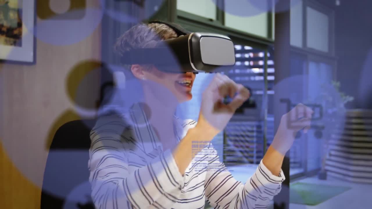 Animation of social media icons and data processing over caucasian woman wearing vr headset