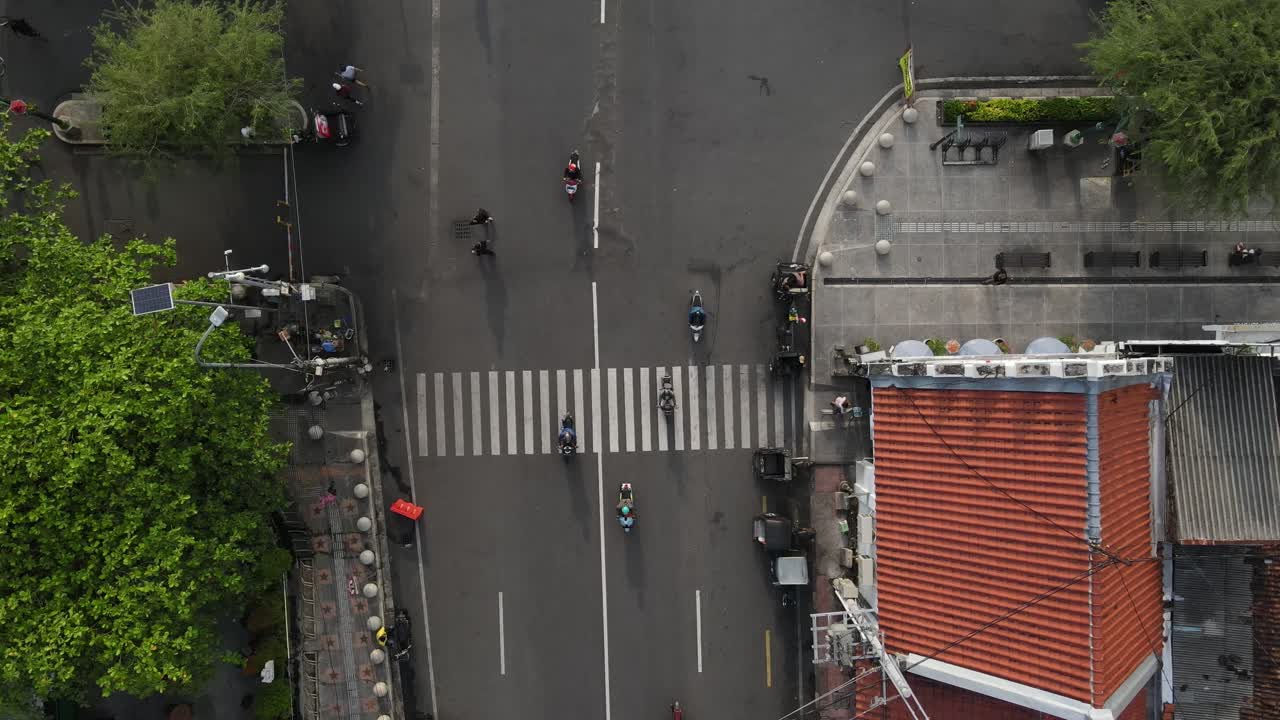 Aerial View of a Busy Street Intersection in a Southeast Asian City