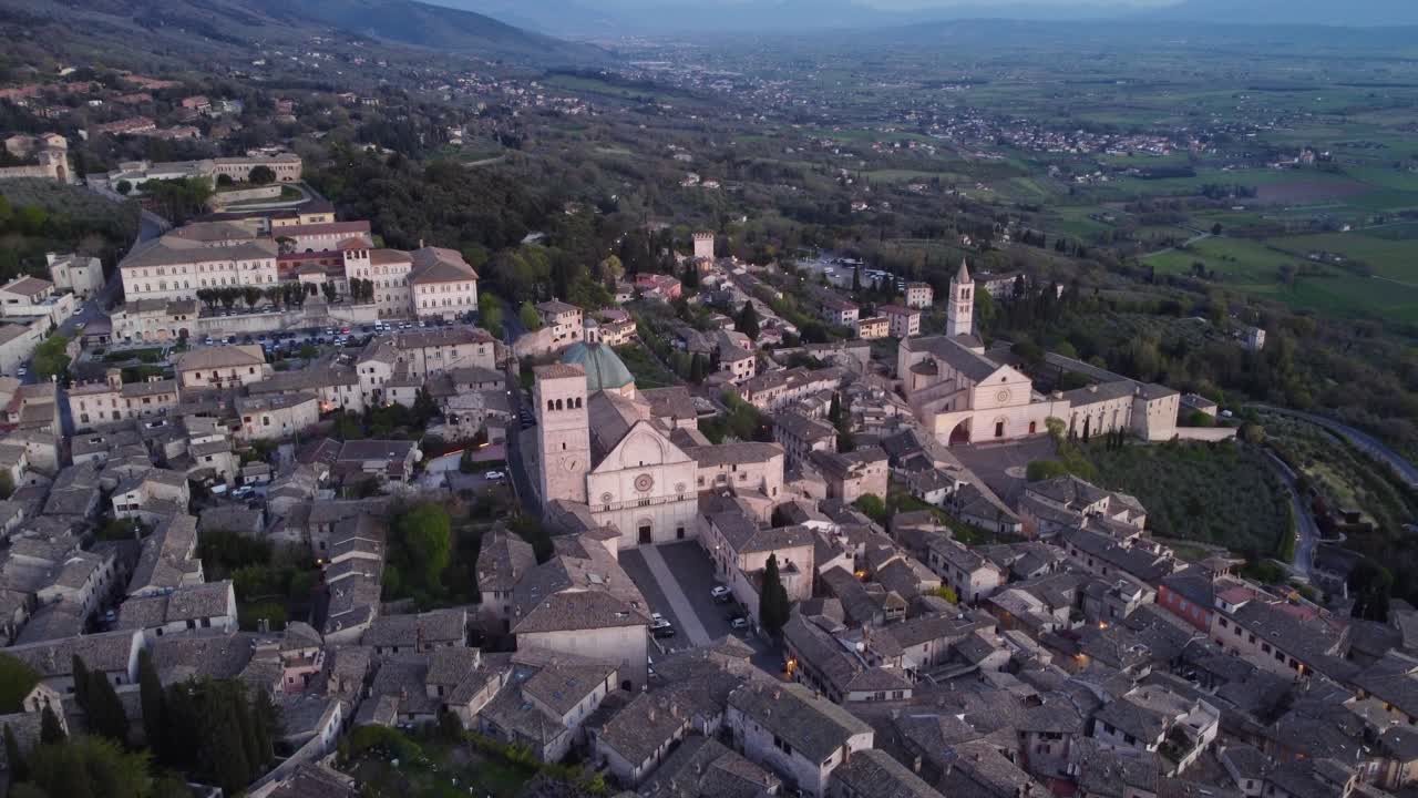 Ascending view of Assisi's city, Umbria, Italy, aerial view, 4k